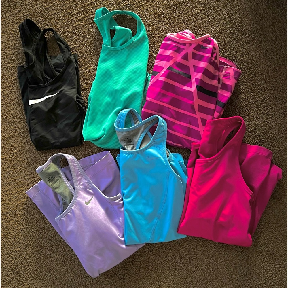 6 Nike Tanks